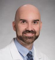 Cory Simpson, MD, PhD, FAAD