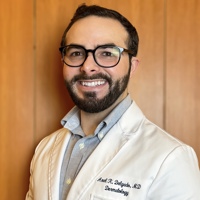 Axel R Delgado, MD